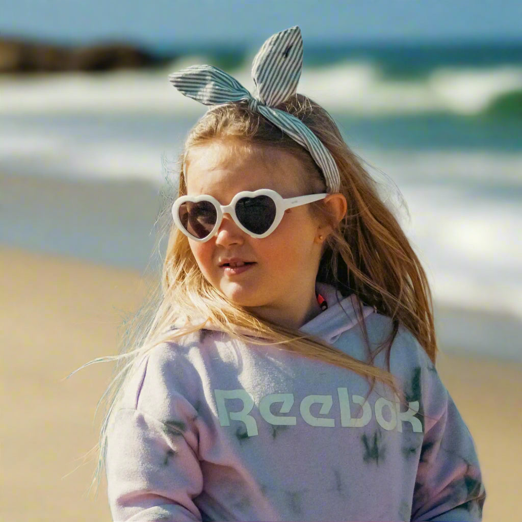 Girl wearing white amour sunglasses